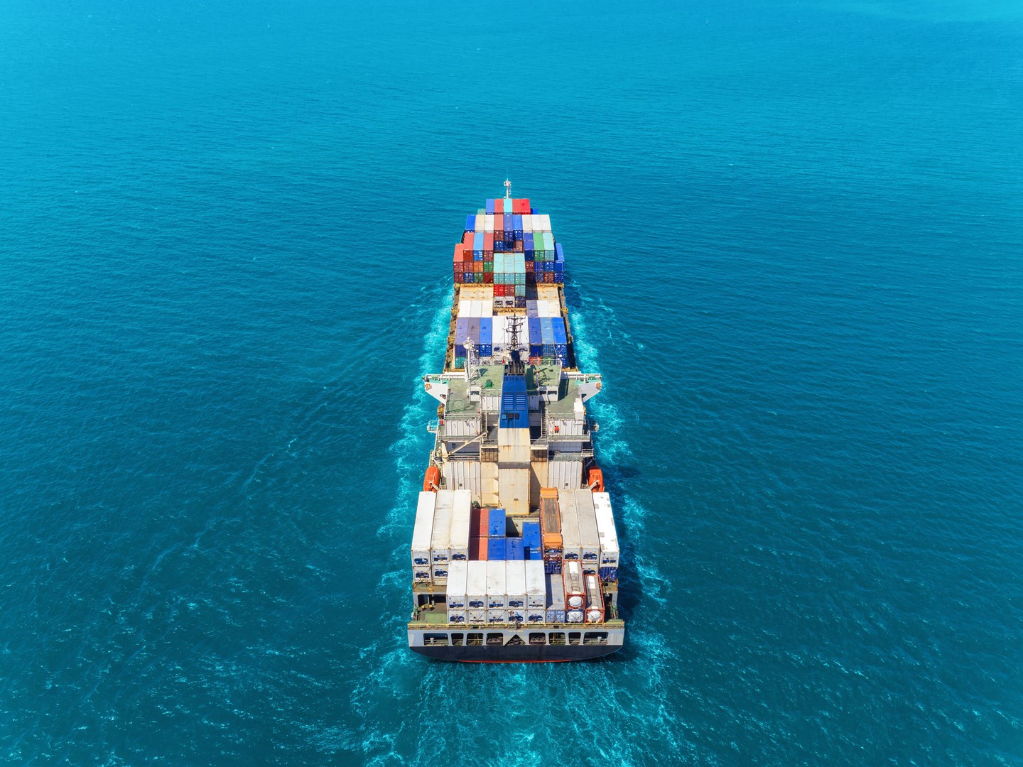 Aerial view container ship at sea full load container for logist